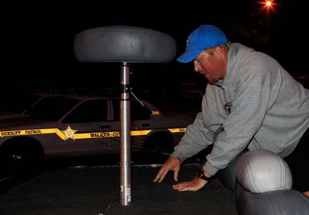 Elite Series pro Greg Vinson puts away his gear just moments before being launched into Smith Lake.