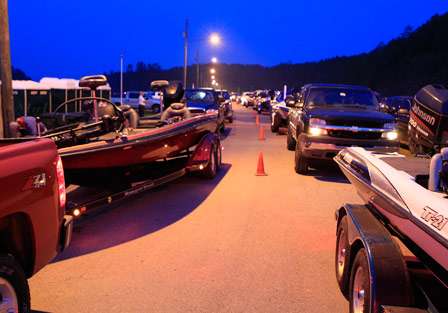 A double row of tow vehicles stretch as far as the eye can see as they wait to launch on Day Two.