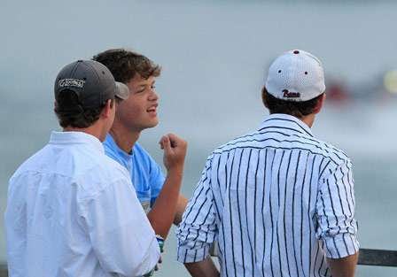 Taylor Busby talks with friends as he watches the anglers launch on Day Two.