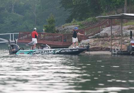 Pro Arnie Lane works hard as he fishes a dock near the main body of the lake.