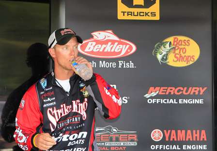 Jonathon VanDam drinks water to re-hydrate after a hard day of fishing. 