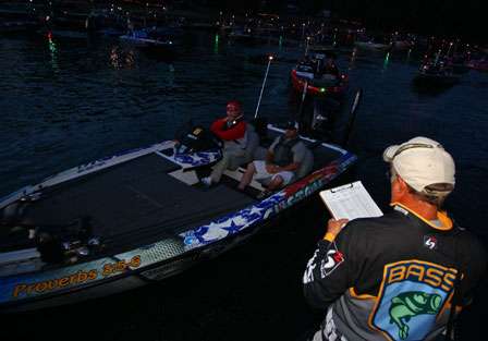 BASS tournament officials prepare the 93 Elite Series competitors for take-off on Day One of the Pride of Georgia.