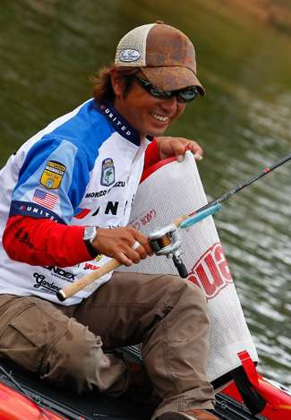 Morizo Shimizu smiles as he puts his rods away and gets his fish ready to take to the scales.