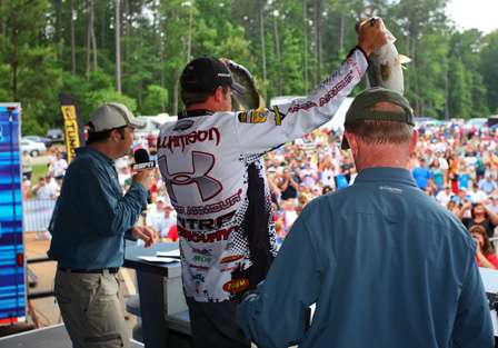 Jason Williamson holds up his monster catch in front of a big crowd of fans in Evans, Ga.