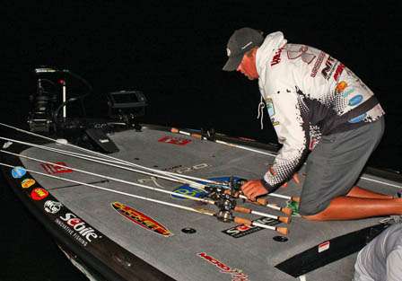 Jason Williamson, Day Three leader, lays out his rods for the final day of competition.