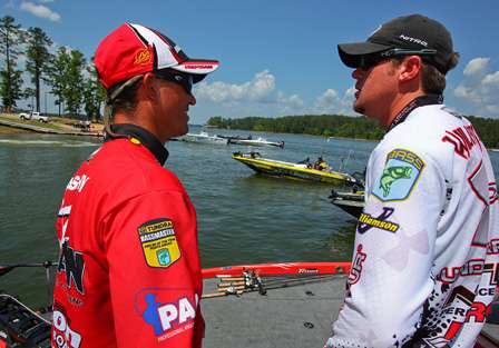 Casey Ashley and Jason Williamson talk as the anglers wait on the docks to trailer their boats.