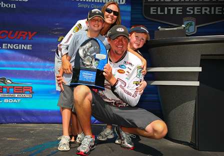 Jason Williamson poses with his family and his second Elite Series trophy.

