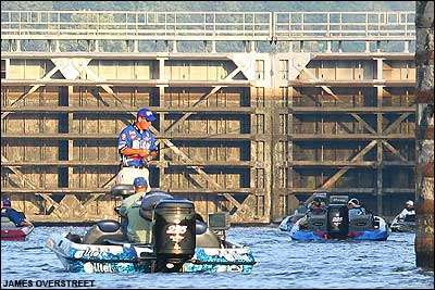 Scott Rook fishes the outside of Murray Lock and Dam on Friday morning waiting for time to lock up river.