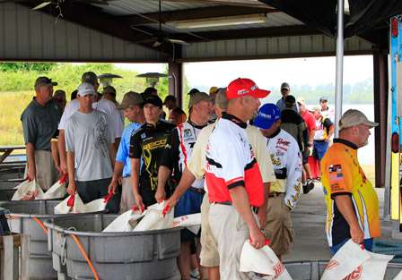Anglers are herded into the tanks behind stage as BASS staff tries to make room for all of the anglers. There are 185 boats in the second Bass Pro Bassmaster Central Open of the year.