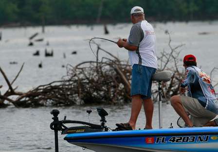 Pro Lee Sisson fights a large fish to the boat. It turned out to be the wrong species of fish, but he said it, 
