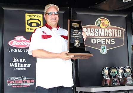 Terry Tyndal takes home the co-angler champion hardware along with a new Triton bass boat.