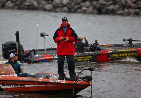 Marty Stone began fishing right outside the off-limits area as other competitors idled by.