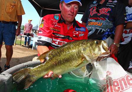 Kelly Jordon gently holds up the biggest fish caught in the tournament, a 10-pound, 1-ounce Kentucky Lake beast.