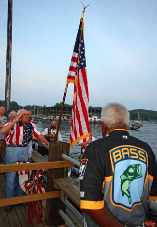 The colors fly as the national anthem is played before the Day Three launch of the Tennessee Triumph.