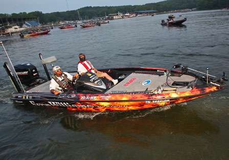 Jason Quinn idles away from the dock in third place after two days of fishing on Kentucky Lake.