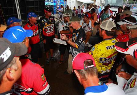 BASS Tournament Director Trip Weldon gives the top 12 their final briefing at the end of Day Three. 