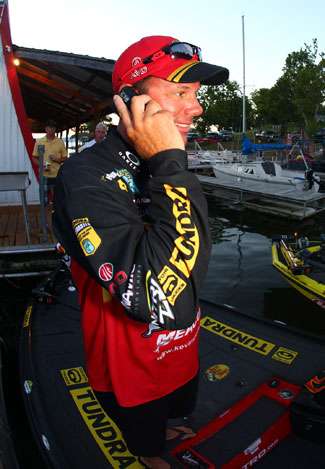 Kevin VanDam calls his dad on Father's Day before he launches for the final day of competition.