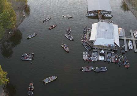 The final 12 anglers and their camera boats get ready for the take off Sunday.