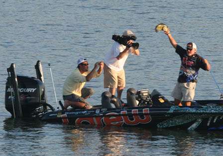 Tommy Biffle holds up a big keeper caught early on Sunday as ESPN Cameraman and Mark Zona capture the action.