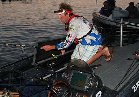 Day One leader, pro Travis Manson unloads the rod locker as he gets ready to defend his first place status on Day Two.
