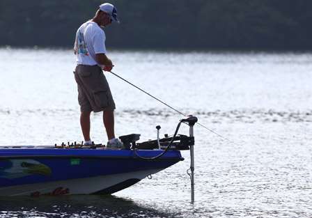 Terry Butcher focuses on his electronics while trying to find schools of bass on Lake Jordan.