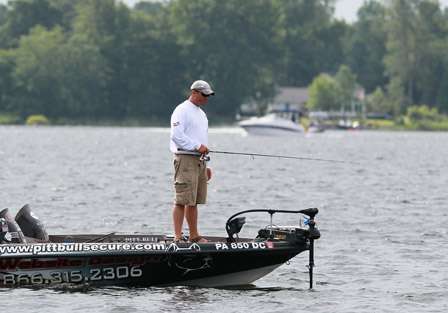 Pro Jason Ober concentrates on his lure as he fishes a place on Lake Champlain,, where current concentrates fish.