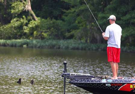 Russ Lane fishes a stump off the edge of the Coosa River.