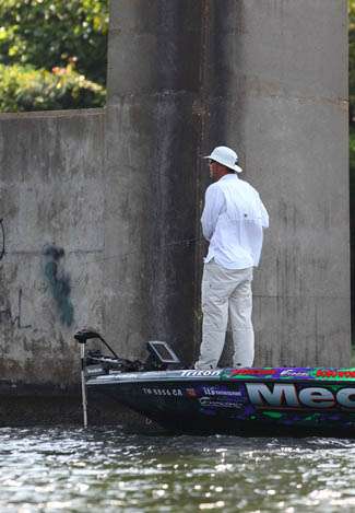 Aaron Martens, no stranger to fishing bridges, fishes around the bridge across the Coosa River.