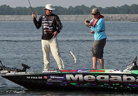 Keith Alan videos Aaron Martens as he pulls in a two-plus pound off a New Lake ledge.