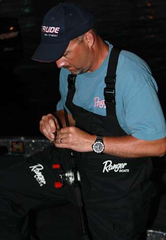Tracy Adams makes lure selections and double checks his gear in preparation for Day Three on Lake Champlain.