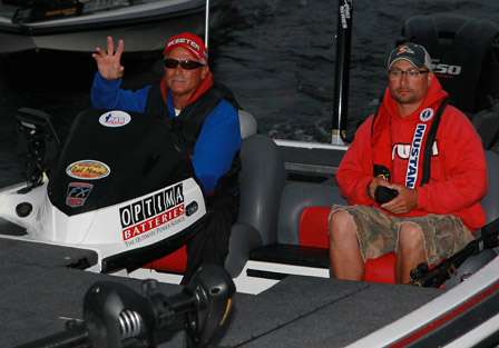 Dave Mansue waves to the ESPNOutdoors cameras on the dock as he takes to Lake Champlain one last time for this event.