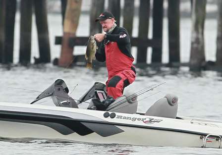 Edward Knight, who is partnered with Elite Series pro Jeremy Starks on Day Three, fights his third bass to the boat moments after the cameras arrive.