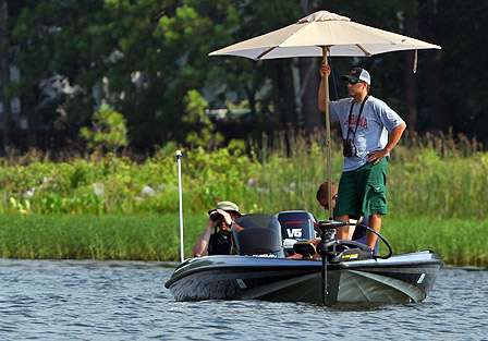Spectators endure the heat and high humidity to catch a glimpse of the anglers at work.