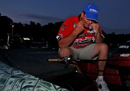 Cliff Pace prepares a lure as Day Two gets underway. Pace finished 10th on Day One with 9-2.