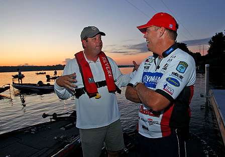 ESPN cameraman Marty Dashiel and Russ Lane wait to stage the boat for takeoff. 