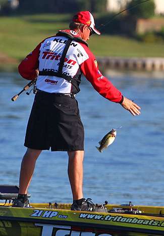 Klein lands a small Lake Jordan bass.