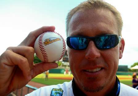 Russ Lane with the ball he would use to deliver the first pitch. 