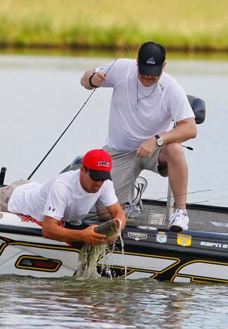 With two hands, Evers has the fish in the boat for his partner Tim Murray.