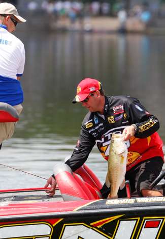 KVD checks to see if this fish will be big enough to take back to the dock for the weigh-in.