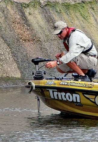 The small bass get tossed back into the Alabama River.