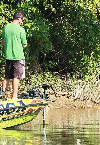 Larger than the last, Remitz pulls the bass out of the river.