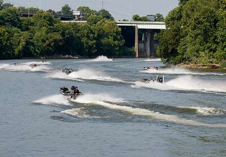 The top 12 are off in search of their prize among the murky waters of the Alabama River.