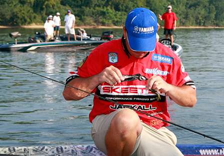 Cliff Pace ties a bait before the Day Two launch of the Evan Williams Bourbon Trophy Triumph.