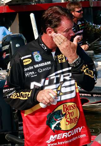 Kevin VanDam prepares for a full day of fishing in the sun.
