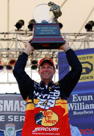 VanDam holds up the Angler of the Year trophy.
