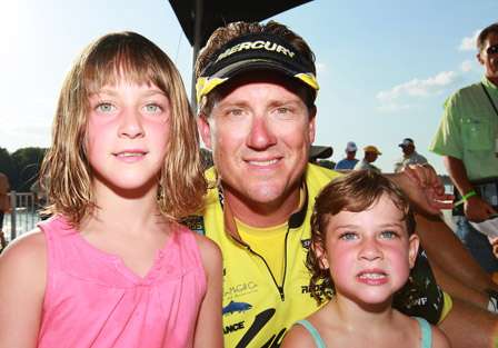 Elite pro Skeet Reese takes a moment for a photo with his biggest fans and supporters, his daughters.