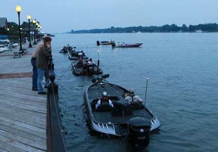 Fans and family stand on the docks to see their favorite anglers off on the final morning of competition.