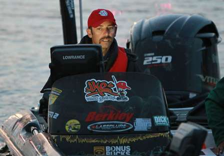 Michael Iaconelli is illuminated by the large screen on his electronics as he idles toward the inspection line.