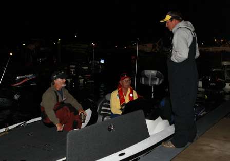 Anglers discuss strategy early at the docks behind the Nauti Goose Restaurant and Anchor Marina.