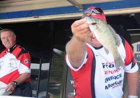 Dwayne Turnage of Maine hides behind the smaller keeper weighed in, a 1-pound smallmouth. At least he did better than the six anglers who blanked.